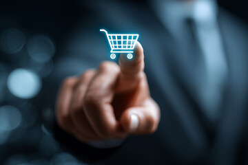 Businessman Touching Virtual Shopping Cart Icon , representing e-commerce, online shopping, and digital business technology.
