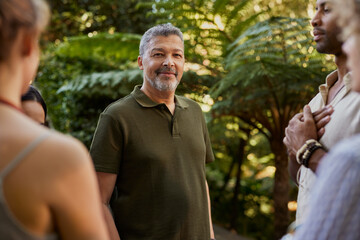 Portrait of middle aged man at meditation retreat