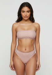 Fototapeta premium Stylish Dusty Rose Banded Bikini Top and Bottom Set Summer Beachwear Fashion