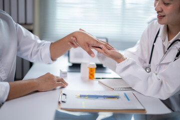 A woman doctor is talking to a patient