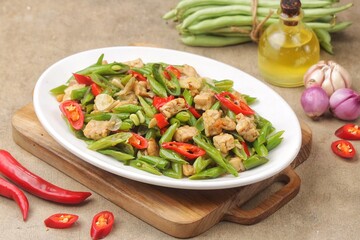 Tumis Buncis. Oseng green beans tempeh is stir-fried green beans cooked with tempeh seasoned with sliced ​​chilies, garlic and shallots