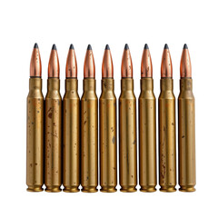 Close-up of gold and copper ammunition rounds lined up on a white background in perfect alignment