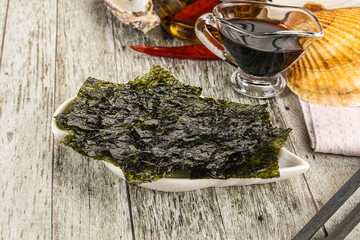Green nori seaweed chips with soya sauce