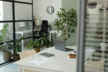 Modern office space with greenery and no people