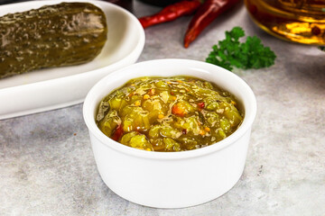 Souce gherkin relish with marinated cucumbers