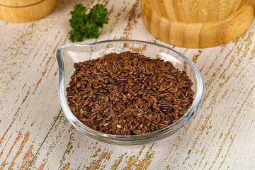 Brown flax seeds in the bowl