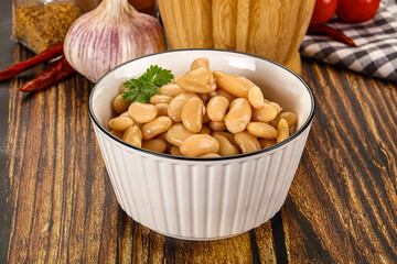 Baked white canned beans in the bowl