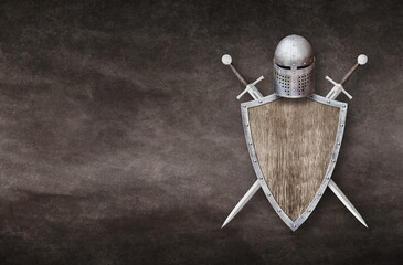 knight helmet shield and two swords on grunge background