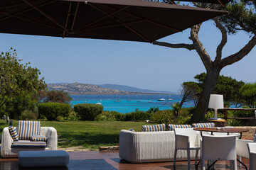 Outdoor terrace with sea view and blue sky in the background