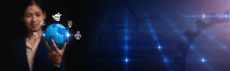 A businesswoman cradles a glowing Earth, surrounded by ESG symbols and a starry blue digital...