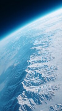 Ethereal snow-draped mountain vista from space, celestial tranquility for International Mountain Day, cosmic wanderlust and introspective zenitude