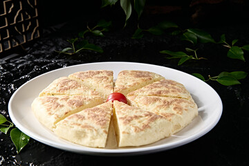 Traditional staple food: wheaten food, fermented white flour pancake