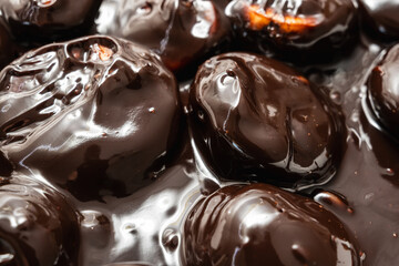 Classic profiteroles coated in rich, glossy dark chocolate sauce