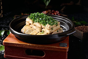 Baked taro strips with green onion in casserole