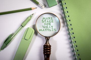 Make Space for What Matters — Minimalist Motivation Concept with Magnifying Glass and Stationery
