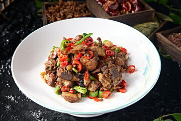 Fried pork ribs with rice pepper, black bean and garlic