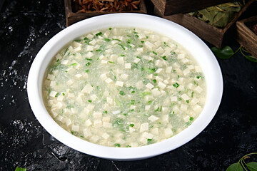 Chinese food: Onion and egg tofu soup