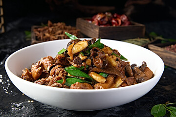Chinese food: Braised chicken with pine mushrooms and garlic sauce