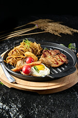 Western food: Fried Angus steak with black pepper sauce pasta