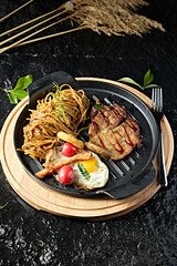 Western food: Fried Angus steak with black pepper sauce pasta