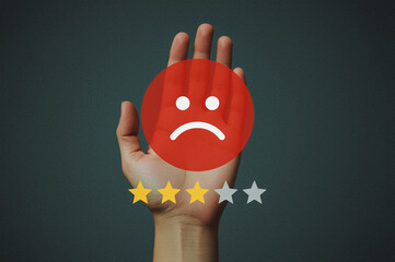 Customer hand showing 1-star rating with sad face emoji, representing negative feedback, poor service, bad review, dissatisfaction, and the low customer experience in the business.