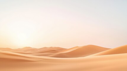 A golden hour scene of vast sand dunes under a soft gradient sky, creating an elegant backdrop for commercial posters with ample copy space