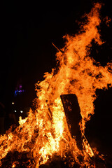 Fire flames on black background, Blaze fire flame texture background, Beautifully, the fire is burning, Fire flames with wood and cow dung bonfire