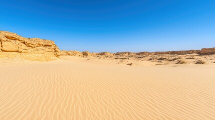Fototapeta premium Serene sand dune environment with gentle curves leading the eye toward open space for text placement