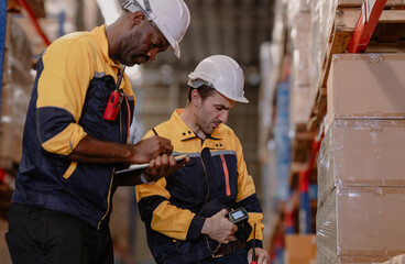 Warehouse manager, store inspector checking stock on storage shelf from inventory checklist. Two...