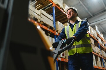 Storehouse manager supervising the lift truck operator