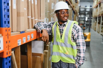 Happy African American warehouse worker
