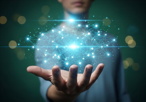 Person holding a glowing digital network of connections and data points in their hand
