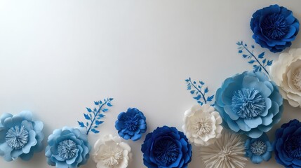 Floral Fantasy in Blue hues: An array of meticulously crafted paper flowers in varying shades of blue and white, arranged against a soft background, evoking a sense of delicacy and artistic charm.