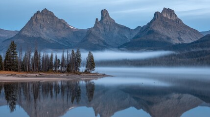 Scenic Mountain Lake Reflection with Forest and Mist in Natural Blue Tones