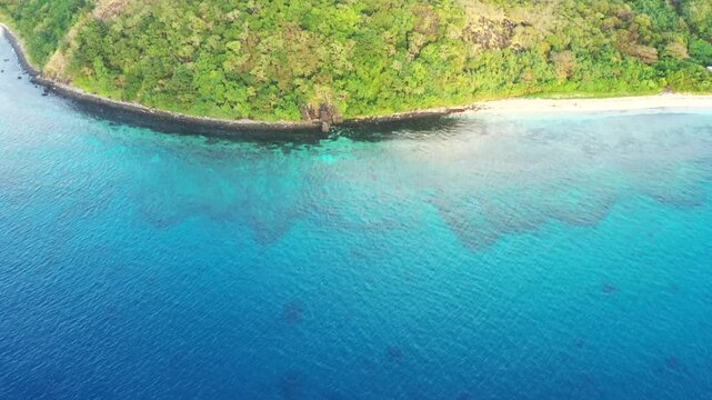 Emerald waters around Tokoriki island in Fiji Pacific tropical tourism resort corals.
