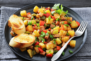 crispy fried cubed potatoes with ham, bell peppers