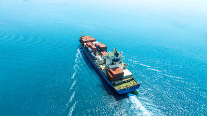 Aerial view of the freight shipping transport system cargo ship container. international...
