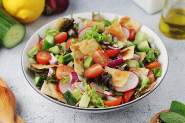 A bowl with Fattoush - Traditional Levantine salad	