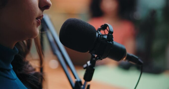 Mouth, woman and host with mic for podcast, content creation or live stream of interview on website. Creative, podcaster and people with tech for talk show, media and digital journalism in studio