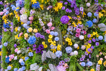 Close-up view of a densely packed arrangement of artificial flowers