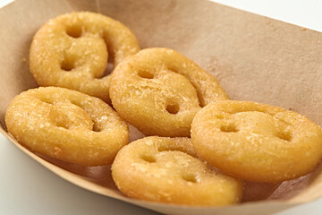 Fast food gourmet fried smiley face hash browns