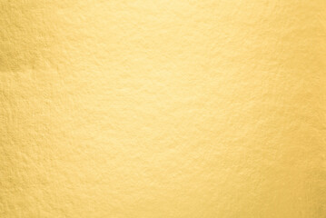Close up texture of golden vintage paper for background