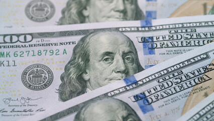 CloseUp Image of U.S. Dollar Bills Displaying the Portrait of Benjamin Franklin Clearly