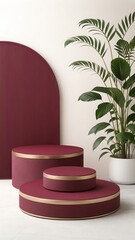 Elegant burgundy and gold tiered display podium with tropical plant, minimalist modern design, luxury product presentation, clean background, sophisticated aesthetic, commercial photography.