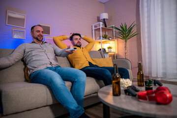 Friends enjoying a gaming night in a cozy living room setting