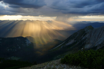 Dramatic Mountain Landscape with Sunlight Beams