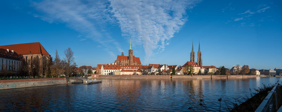 Panoramic view od beautiful reflection of the St. John the Baptist Archcathedral at the Cathedral Island, Wroclaw - Powered by Adobe