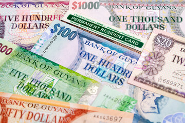 American permanent resident card on Guyanese dollar