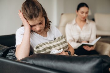 Don't want to talk, feeling depressed. Girl at a psychologist's appointment