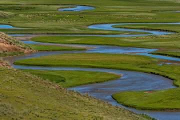 The winding picturesque riverbed of the Kegen River in the Almaty region in southeastern Kazakhstan